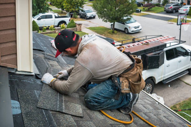Professional Metal Roofing technician working in Brockton, MA